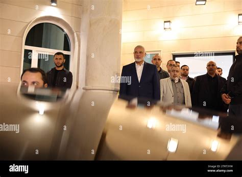Doha, Qatar. 20th Dec, 2023. Hamas leader ISMAIL HANIYEH (C) after a ...