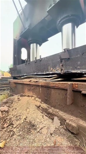 Large press machine presses steel plates—shocking industrial scene!