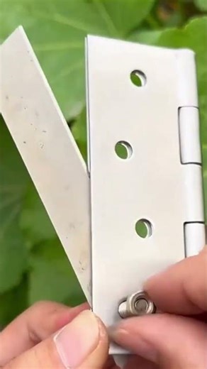 the process of making a cable cutting assembly tool from iron hinges and crankcases.