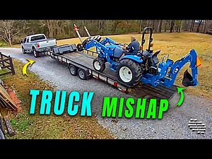Truck Moved While a Man Was Loading a Tractor on Its Trailer
