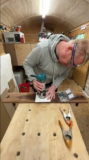 3d printed a jig to attach keyhole brackets to the back of welly racks