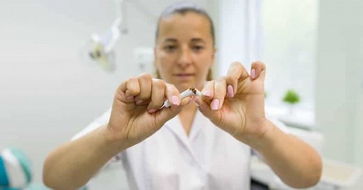 Smoking After Tooth Extraction: How Long Do I Have to Wait? - Dentaly.org