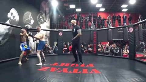 Russian 'Popeye', 23, with bulging bicep is defeated after only three minutes in MMA fight