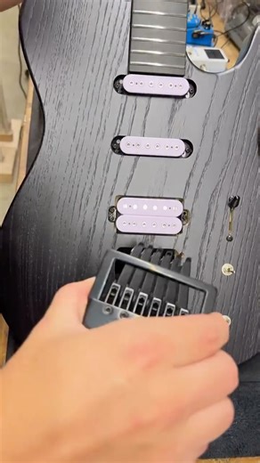 Kiesel Guitars on Instagram: "Installing an @evertune bridge on a 30” baritone Solo guitar"