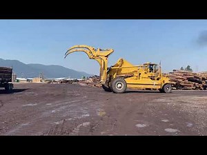 1972 Wagner L120 unloading logs
