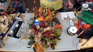 How To Make A Blue Truck Fall Wreath You can watch the full tutorial over on our blog: https://howtomakewreaths.com/fall-grapevine-blue-truck-wreath/ | DecoExchange