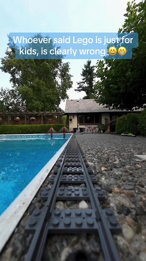 Our Lego train pool layout with a custom Lego bridge! #lego #legotiktok #legos #legotiktoker #customlego #legotrain #legotrains #afol #afolkfolbricks #oddlysatisfying