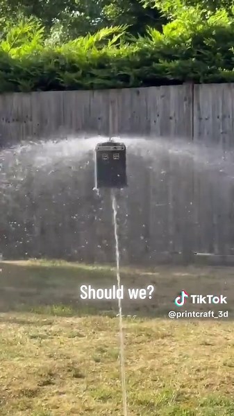 Flying Tardis Ornament: A Garden Watering Marvel