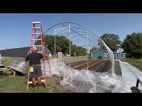 Bootstrap Farmer high tunnel build #7 — Plastic on end walls, main, and roll up sides