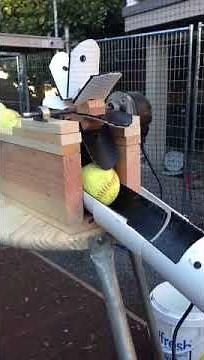 Automatic pitching machine ball feeder