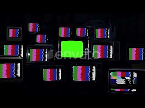 Old TV with Green Screen and Many Retro TVs with Color Bars. (Stock Footage)