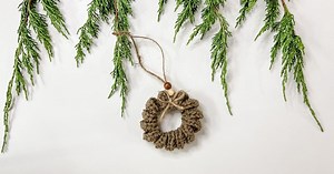 Mini Christmas Wreath Ornament free crochet pattern and video tutorial.