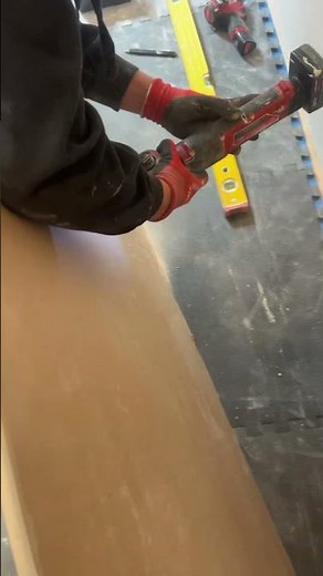 Cutting drywall with oscillating Multi tool Milwaukee.