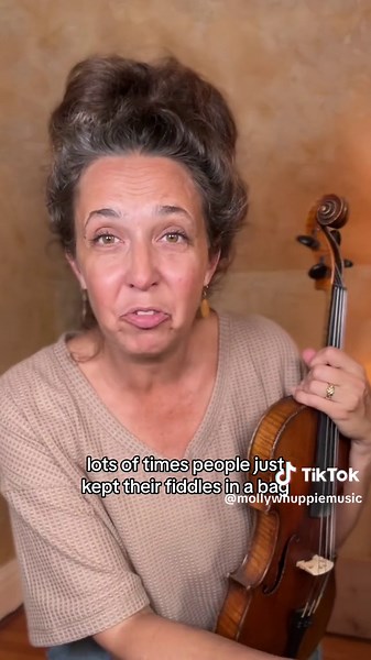 Show-And-Tell: Rattlesnake tail in my old fiddle. Its a folk tradition. #folkmusic #rattlesnaketail #showandtell #fiddle