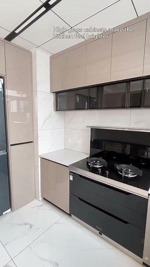 High gloss cabinets make the kitchen feel brighter~