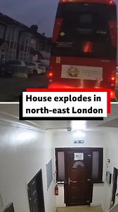 This explosion that blew up a house and caused a fire in north-east London was caused by gas, the London Fire Brigade has said. Footage showed a huge blast at the property in Ilford - which had been converted into flats - with chunks of masonry being thrown into the street. Two people remain in hospital after being rescued through a window by firefighters and a third person was treated at the scene following the explosion on Tuesday afternoon. The roof of the building was destroyed and the rest 