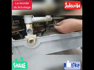 Réparation et entretien d'une machine à laver semi-automatique.