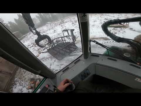 Timberjack 810 sermin kanssa taistelua