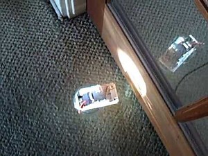 Solar energy redirected into a house using a mirror