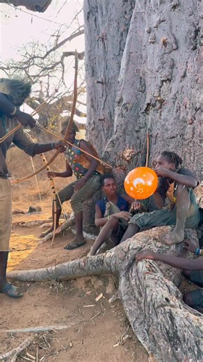 Vinod kumar on Instagram: "“Hunter’s Balloon Surprise: A Hilarious Jungle Moment as an Arrow Pops It!” JungleFun, #BalloonBurst, #HunterHumor #ViralMoment #hadzabetribe #viralreelsシ #fypシ゚ #foryouシ #wildlife #tranding #challenge #scary #facebookviral #travelblogger #travelgram #travel #wildlife #reelskarofeelkaro #challenge #hadzabe #wildlife"