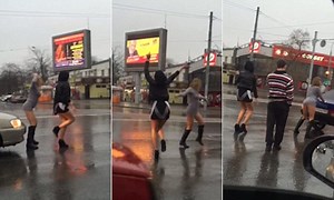 Carefree women dance in the middle of the street in Russia