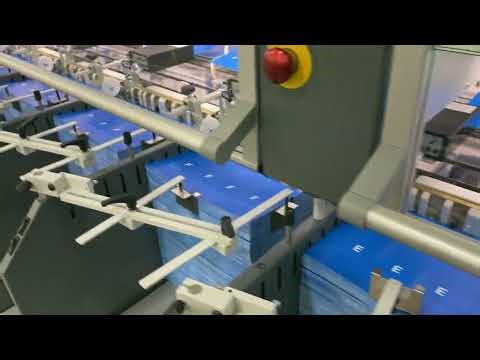 MKW Rapid Collator Machine running first In Store POP Collating Job