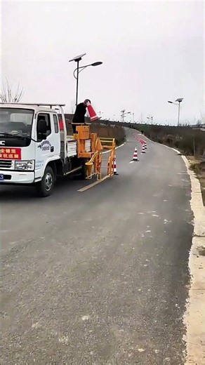 Roadway Guardians: Automated Isolation Barrel Installation