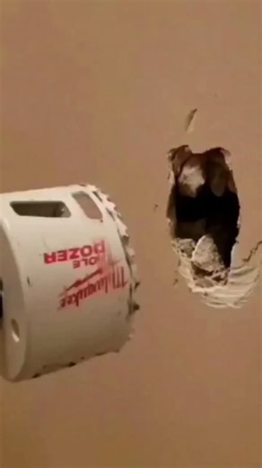 Easy way to patch holes in drywall. Grab a hole saw and a scrap piece of drywall. Cut out the damaged drywall using the hole saw, then cut into the back of the new drywall with the hole saw. Tear away the excess drywall without damaging the paper then you can use this to patch the wall and it fuses on extremely strong. #drywaller #drywallfix #drywallrepair #diyrepair #homemaintenance | Meyers.makes