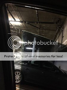 Front drivers side window off track. (pics)