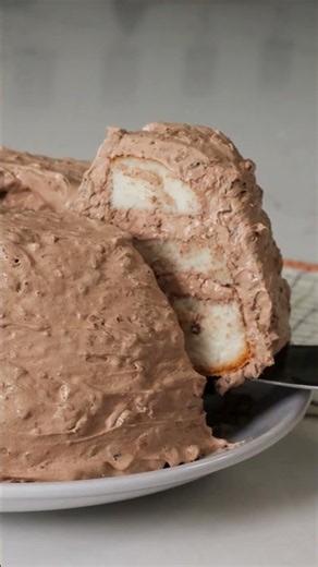 This bakery-looking cake starts with a store-bought base and a bowl of Cool Whip