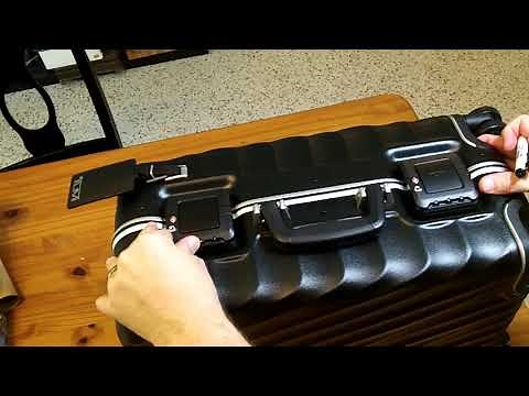 HOWTO: Program/Change the combination on TUMI international snap latch luggage locks