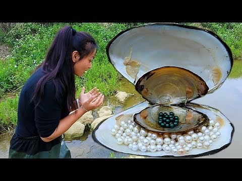 I found a rare treasure on a mother clam, which is an emerald green pearl