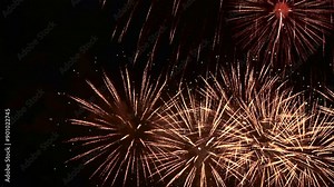 Closeup shot of fireworks exploding in the night sky. Explosion of pyrotechnics. 4K Stock Video