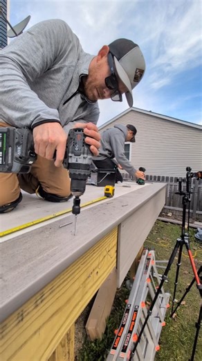 Jonny Irwin on Instagram: "Installing the border on this tile deck with PVC decking with hidden plugs"