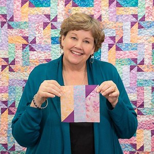 Jenny shows off some simple steps to create this darling little pinwheel block. Click here to watch the full Spring Twist Quilt tutorial come together: https://bit.ly/2vq7NNT What is your favorite way to make pinwheels? Share with us in the comments. | Quilting Deals - Missouri Star Quilt Co