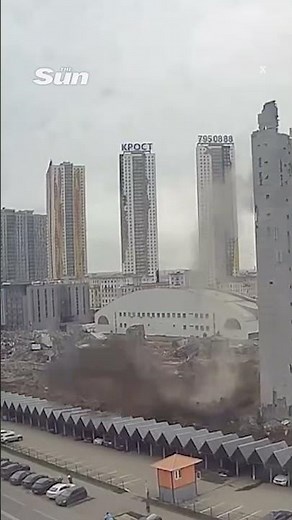Top floors of skyscraper structure fall off and crash into the ground in Russia
