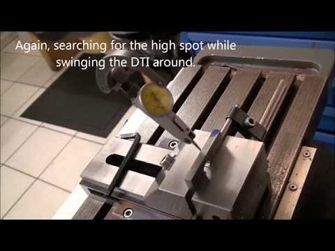 Centering workpieces on the milling machine using a DTI