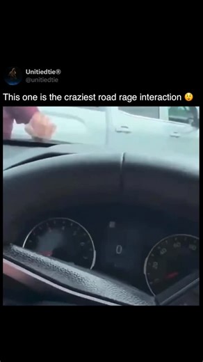 Unitiedtie Spooky ® on Instagram: "A video out of Orange County shows a man losing his cool during a road rage incident. He got out of his car and started punching another driver’s window over and over, but the glass didn’t even break. His wife stepped in to stop him before things got worse, and police later reviewed the footage. The clip has been making rounds online as people talk about how quickly anger can escalate behind the wheel. Many are weighing in on how dangerous road rage can be and