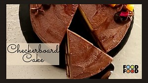 Can you resist these 4 layers of fluffy, sweet, and buttery goodness? Try this mesmerizing checkerboard cake which is so much fun to make and even more fun to devour, because the real deal is inside it! #dessertrecipe #checkerboardcake #layeredcake #foodfood | FoodFood