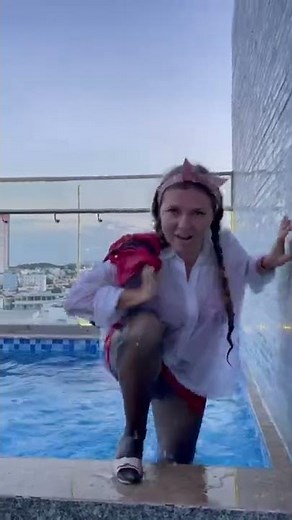 Wet red dress, white shirt, jeans jacket, nylon and high heels.