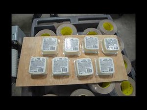Top/bottom Cheese block labeling system with CTM 360a merge label applicators and RL Craig handling