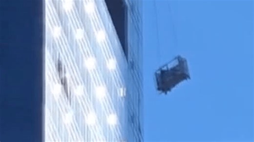 VIDEO: Window washers swing and dangle from skyscraper after scaffolding breaks