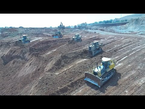 Caterpillar D9T Working With Caterpillar D9R And Komatsu D275AX Bulldozers