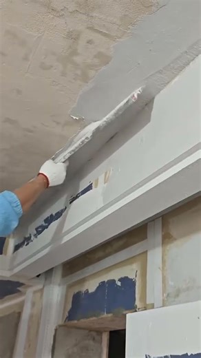 the process of plastering the ceiling of a room to cover the ceiling joints