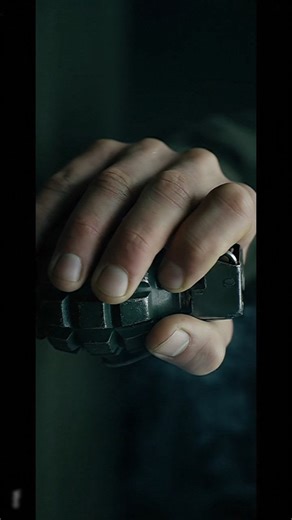 What are the consequences of a hand grenade exploding when handled?