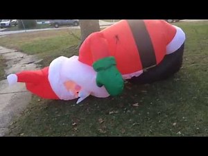 Santa Claus inflatable yard decoration coming to life.