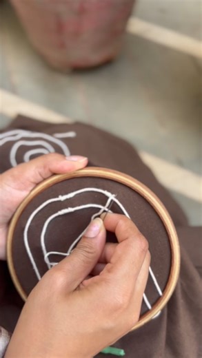 Art Weave on Instagram: "Every thread finding it’s own path and somewhere between those lines🪡 the Woven Thread shirt found its form through couching embroidery - made easy, woven freely and wrapped in softness 🧵✨ DM to shop yours 🌿 [hand embroidered shirt, embroidery art, homegrown clothing brand, slow fashion, handmade in India, artisanal] #slowfashionbrand #handcrafted #couchingembroidery #embroideredshirt #indiancraftsmanship #cottonshirt #smallbusiness #artweave #unisexshirt #wearableart