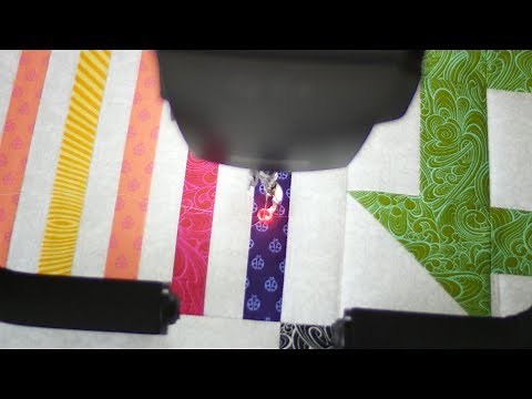 Tutorial: using the Needle Point Laser on the BERNINA Q 24 or Q 20 longarm quilting machine