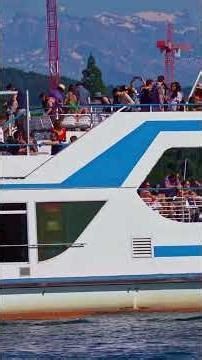 Zurich city lake passenger ship Albis arriving at pier.