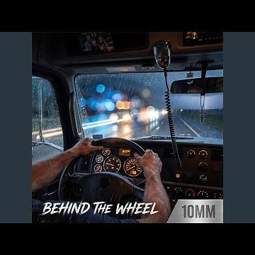 BEHIND THE WHEEL
